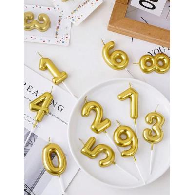 Vela Dorada en forma de Numeros